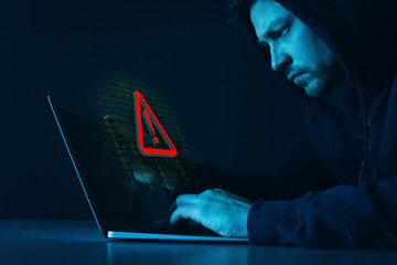 Cyber attack alert notification. Red warning sign and binary code on virtual screen. Hacker using...