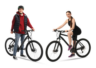 Young man and woman with bicycles on white background