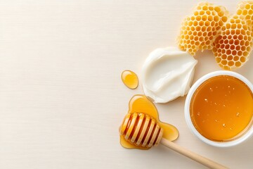 Honeycomb and honey dipper with yogurt, Fresh organic honey, Healthy breakfast ingredients, White wooden background, Natural food concept, Minimal styling, Copy space

