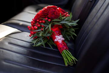 Red rose bouquet in car seat
