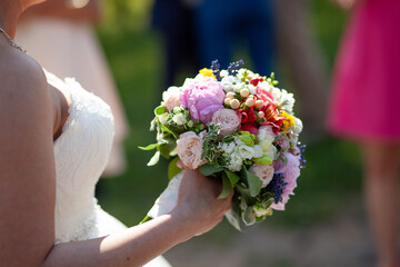 Bride Holding Colorful Wedding Bouquet