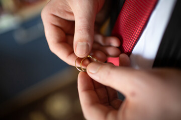 Groom Holding Wedding Rings Before Ceremony