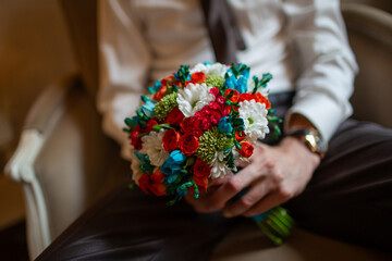 Groom Holding Wedding Bouquet