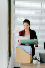 Female secretary holding file searching for documents in office. Young woman checking business documents, checking accounts, searching for documents, tax, accounting.