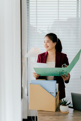 Female secretary holding file searching for documents in office. Young woman checking business documents, checking accounts, searching for documents, tax, accounting.