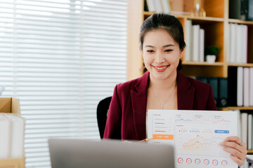 Young woman in online meeting using laptop. Young woman studying online.