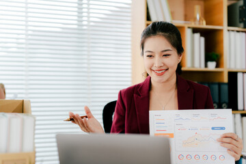 Young woman in online meeting using laptop. Young woman studying online.