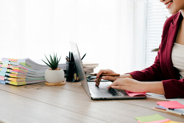 Asian business woman Business document check, account check, document search Legal documents, document preparation, reports, tax analysis, time, accounting, data sheets