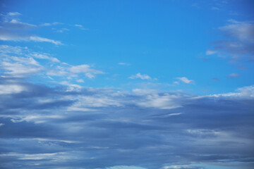 Sunset sky in bright blue tones. Background with impending bad weather in anticipation of rain.