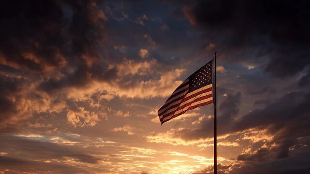 united state flag on pole with cloudy sky