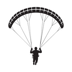 Black silhouette of person paragliding white
