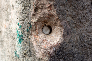 Wall texture made of beaten cement. Background for projects.