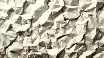 Close-up of crumpled beige paper Textured, abstract surface with sharp folds & shadows, conveying chaos & imperfections - Powered by Adobe