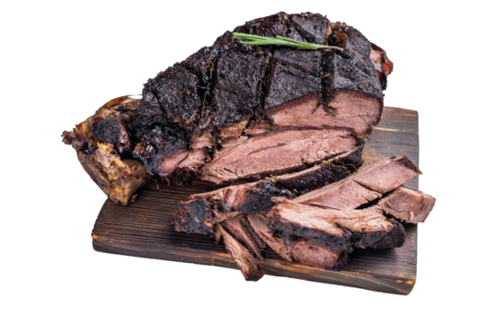 Slow ccoked sliced Venison leg, roasted game meat of deer on a board with herbs isolated on white background. top view