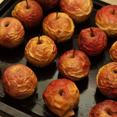 Baked apples on a baking sheet