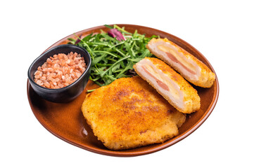 Chicken Fried cordon bleu cutlet on plate with salad isolated on white background. top view