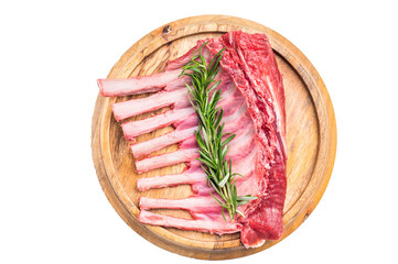 Uncooked rack of lamb, raw mutton chops on wooden board isolated on white background. top view