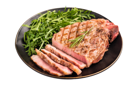 BBQ grilled pork tender steak, neck meat, on plate with salad isolated on white background. top view