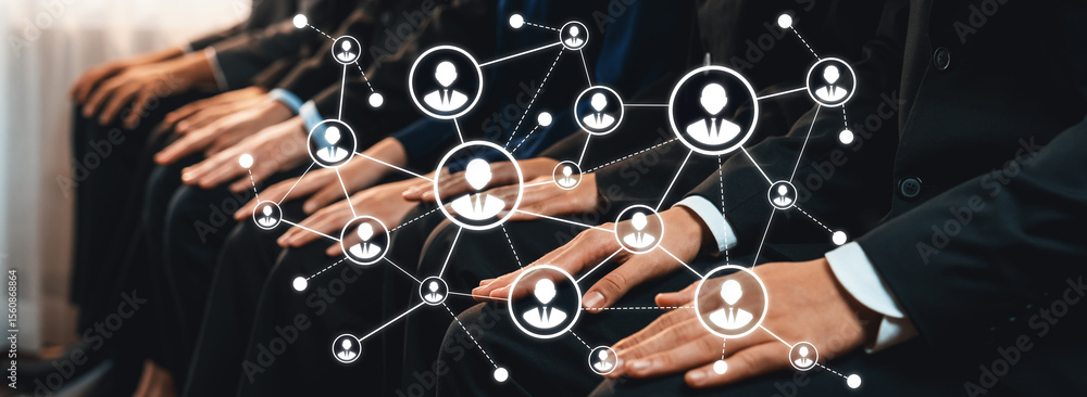 Poster this image depicts business professionals engaged in networking, with a digital network overlay symb