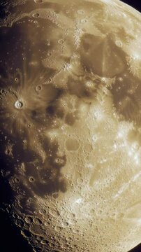 A detailed view of the moon's surface against a dark background, ideal for use in space-themed designs or as a symbol of mystery