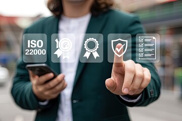 Man touches screen with iso 22000 certification and quality assurance icons for food safety management systems