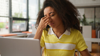 African American student girl woman female business woman businesswoman feel migraine touch nose...