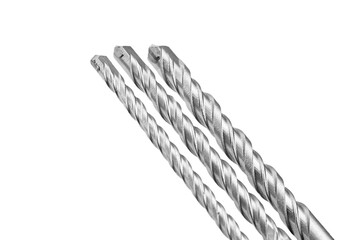Three metallic twisted drill bits arranged in a row, showcasing their sharp tips and spiral design,...