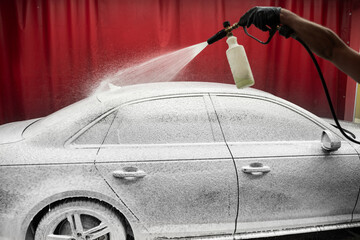 High-pressure snow foam application ensures deep cleaning and softens grime on car surface. Car...