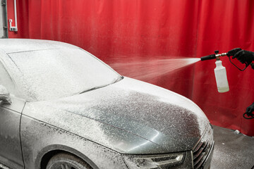 High-pressure snow foam application ensures deep cleaning and softens grime on car surface. Car...