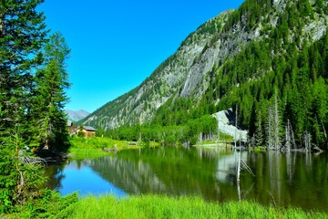 View of Konrad lake bellow the mountains in Dösen valley in High tauern mountains, Carinthia, Austria