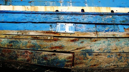 wooden slats on worn wooden boat keel
