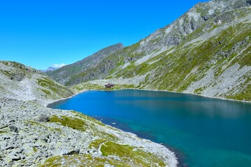 View of blue colored Dösner lake in Dösen alpine valley in High Tauern, Carinthia, Austria