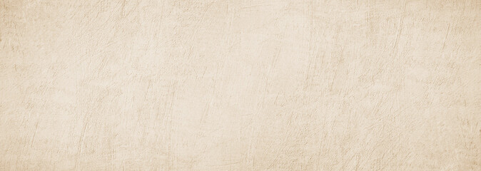 Light brown beige concrete wall surface texture. Sepia сhampagne cream nude white background. Pale soft pastel shade. Close-up. Simple minimal. Blank empty. Template. Design. Wide banner. Panoramic.