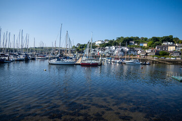 Kinsale Bay and Harbor looking at the coastline where boats sail and the village people are connected to the ocean by a maritime culture with