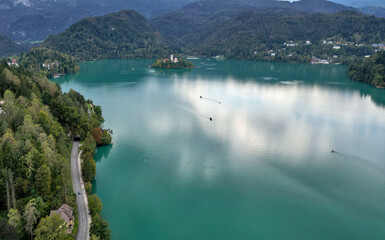 aerial view of lake bled slovenia (famous mountain lake in the julian alps with medieval castle on...
