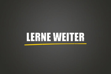 Lerne weiter (Keep learning) - A blackboard with white text.