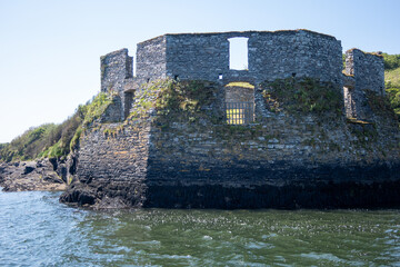 Kinsale, Ireland, May 21, 2024: Jame's Fort British Fortress Ruins on Kinsale Bay with Rosk Walls and Ramparts making up the castle and the Bay Defence as seen from a Boat