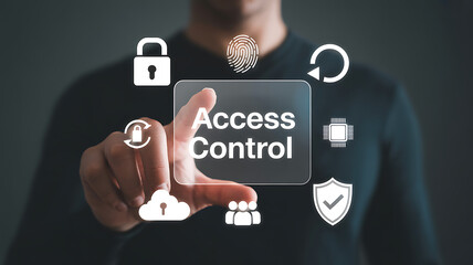 A man pointing at a transparent access control interface with security icons around it