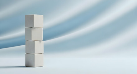 Stack of Four White Blocks Minimalist Composition on Soft Blue Background