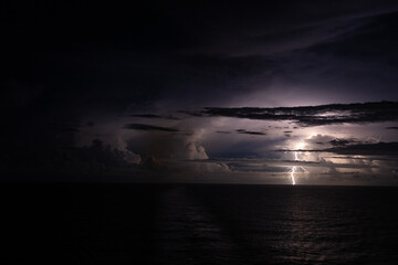Lightning Bolt Over The Ocean at Dusk