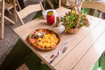 Scrambled eggs with ham and beans, traditional mexican breakfast