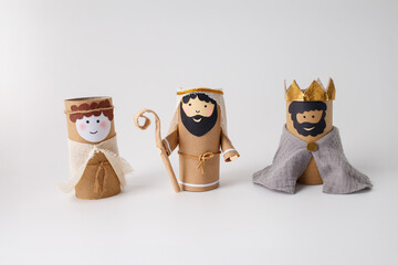 Three wise men figurines made from cardboard tubes. Christmas decoration and holiday craft. Useful...