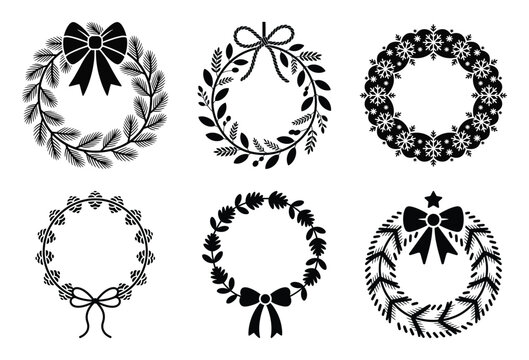Collection of six black christmas wreath silhouettes isolated on white background