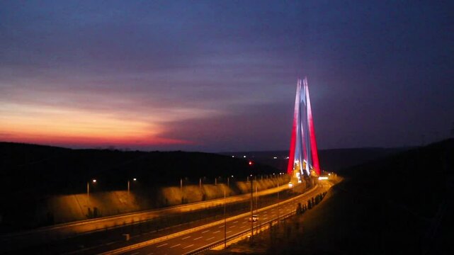 Yavuz Sultan Selim Bridge Istanbul Turkey Turkiye Modern Bridge Over Highway at Dawn Dusk. An expansive landscape shot of a modern cable-stayed bridge spanning a Highway. 