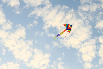 Colorful kite in blue sky