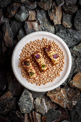 Beef Tartare with Truffle and Foie Gras on stones