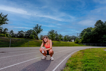 Summer Grind: Teen Athlete Trains with Determination for Upcoming Track Meet