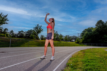 Summer Grind: Teen Athlete Trains with Determination for Upcoming Track Meet