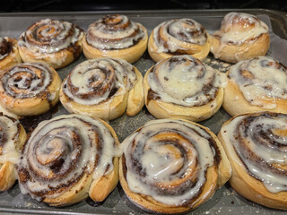 Homemade cinnamon rolls with cream cheese, top veiw. homemade pastry - cinnabons for breakfast or...