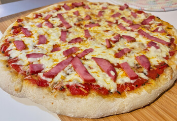 Pizza with ham and cheese